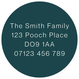 Back of deep teal dog identity tag with address